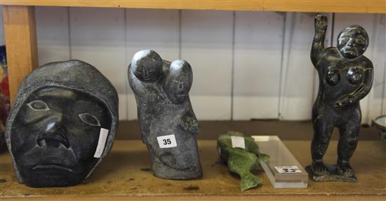 Four Eskimo soapstone carvings